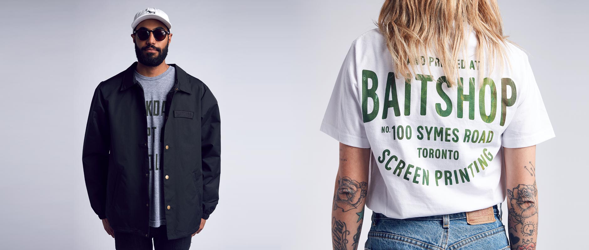 Male model on left with Baitshop Hunting Dad Hat and Coach Jacket, Female model on right with Stockyards sear sucker t-shirt